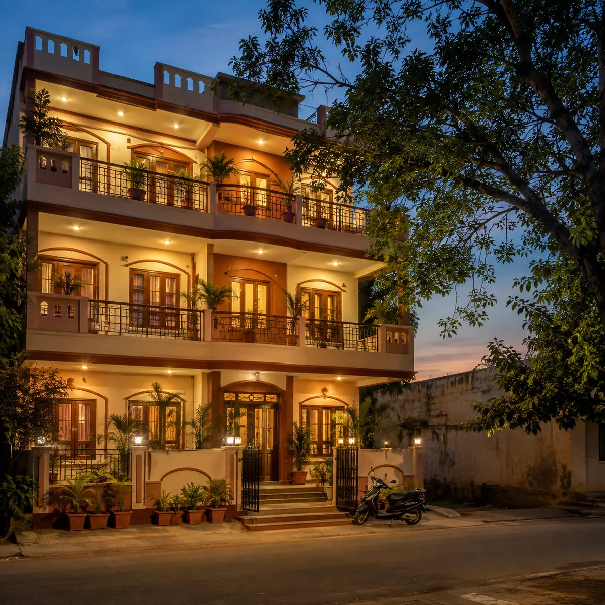 Front of the building, evening, wide shot